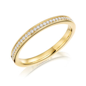 An 18ct yellow gold brilliant cut diamond set band.