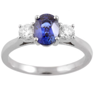 Platinum Oval Sapphire & Brilliant Cut Diamond Three Stone Ring