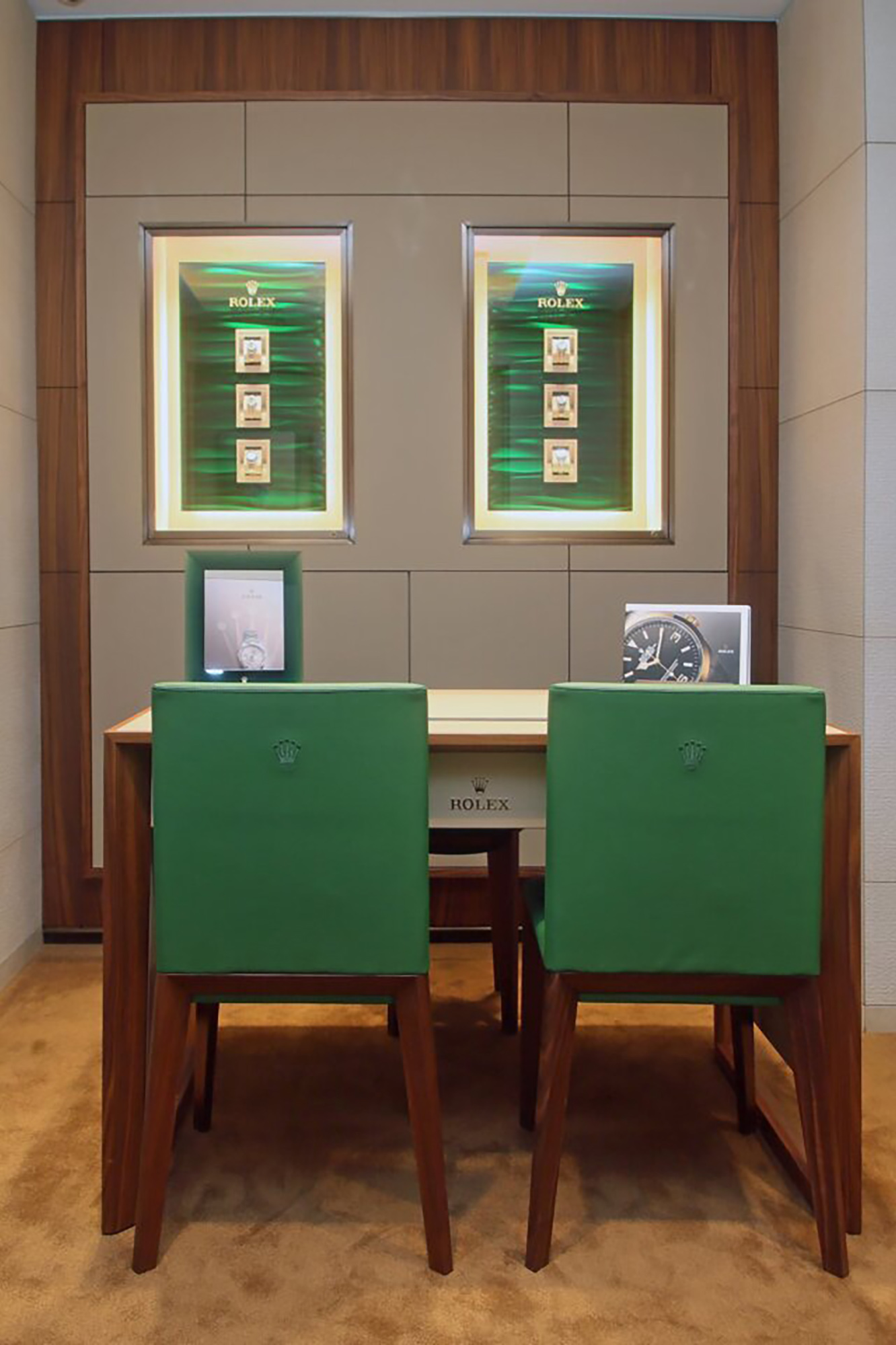 Back of 2 green chairs at HL Brown Rolex showroom in Sheffield.
