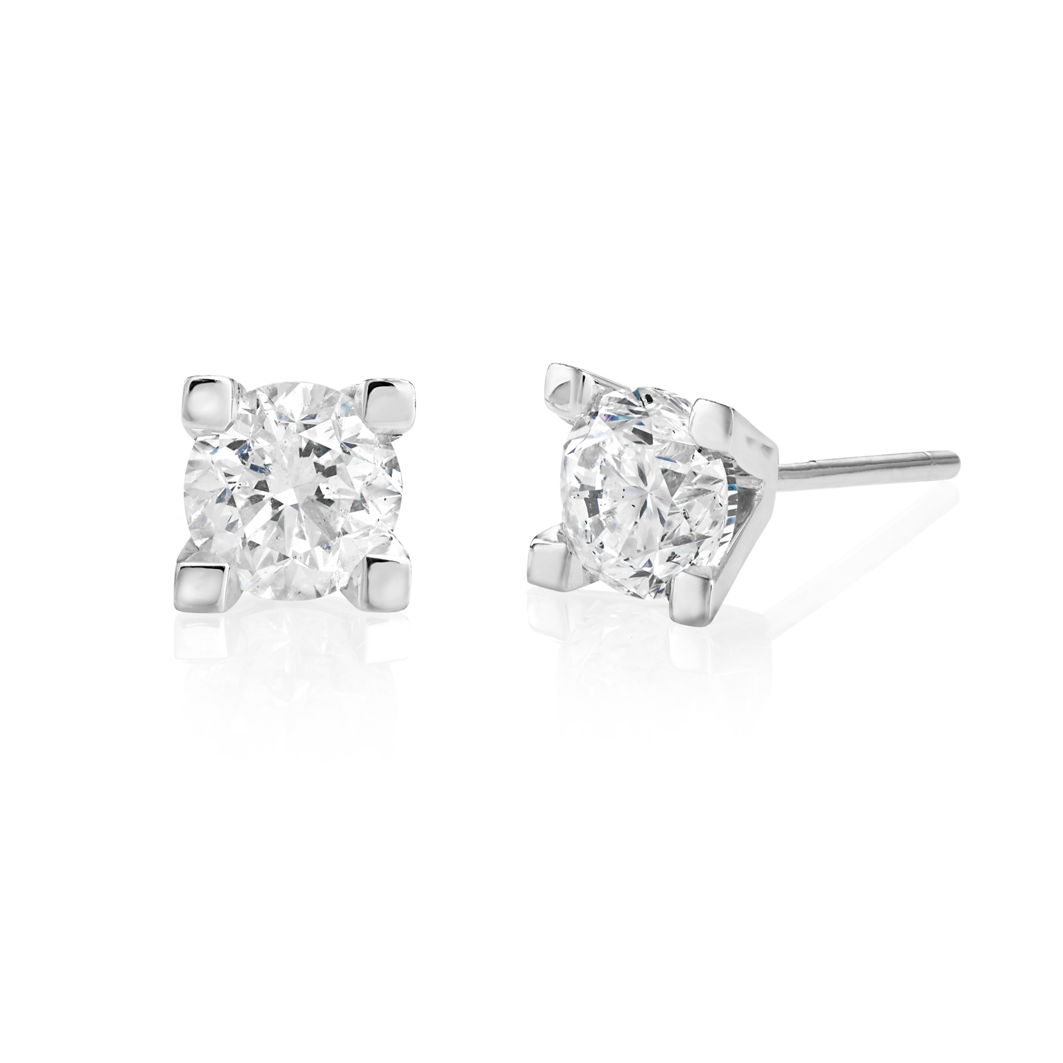 A pair of 14ct white gold round brilliant cut diamond single stone stud earrings, for pierced ears.