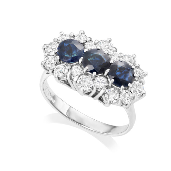 An 18ct white gold brilliant cut sapphire and diamond triple cluster ring.