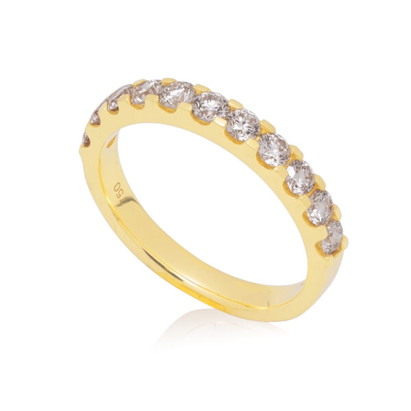 An 18ct yellow gold round brilliant cut diamond eleven stone half eternity ring.