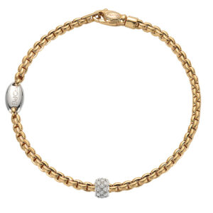 An 18ct yellow gold bracelet with pave diamond set rondel in white gold belonging to FOPE's EKA Tiny collection.