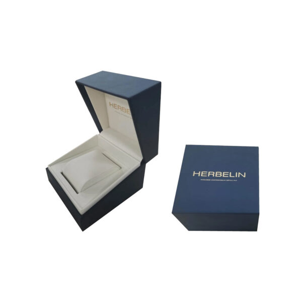 A blue Herbelin watch box.
