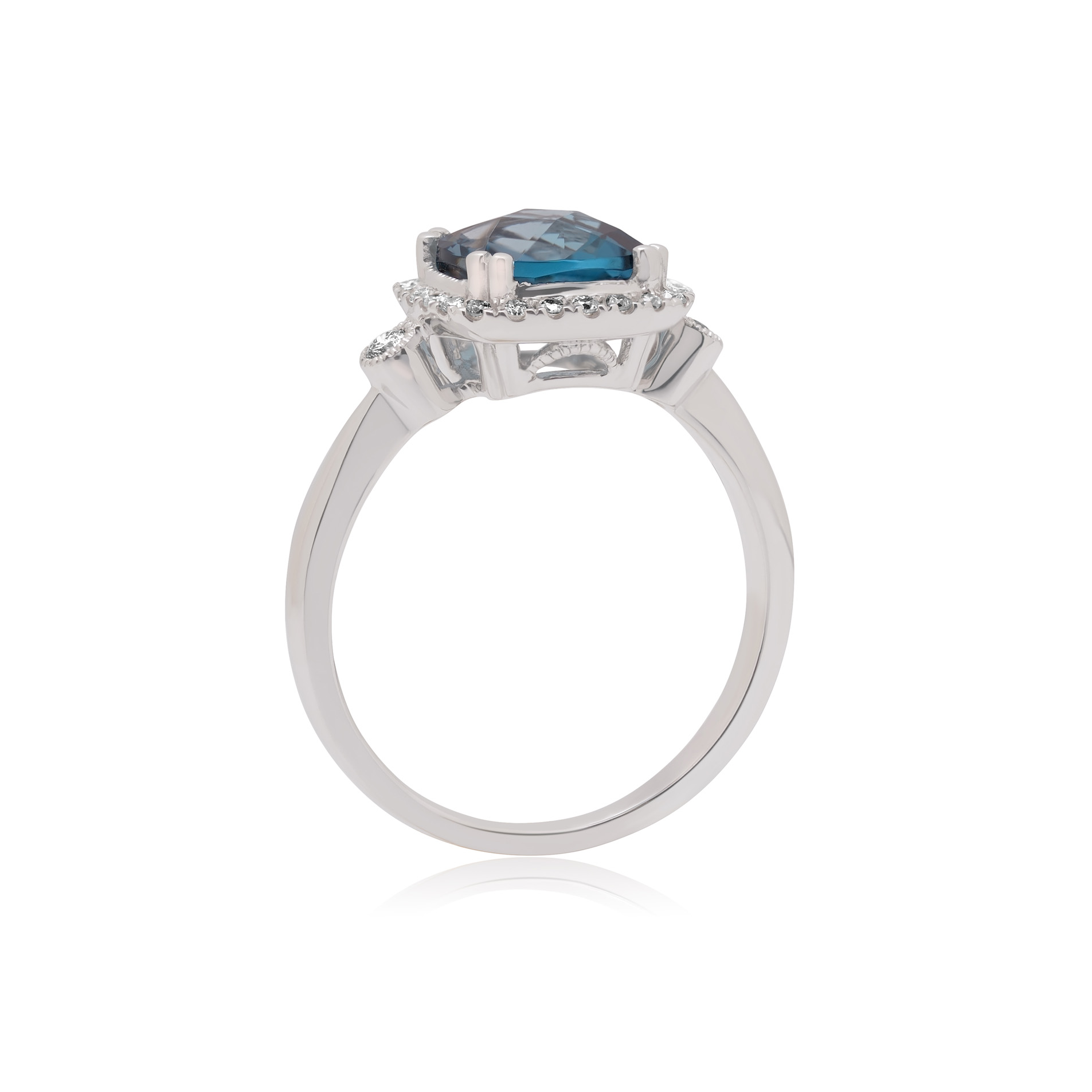 A 9ct white gold blue topaz and diamond set fancy cluster ring.