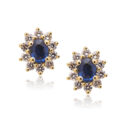 A pair of 18ct yellow gold oval sapphire and diamond set cluster stud earrings, for pierced ears.