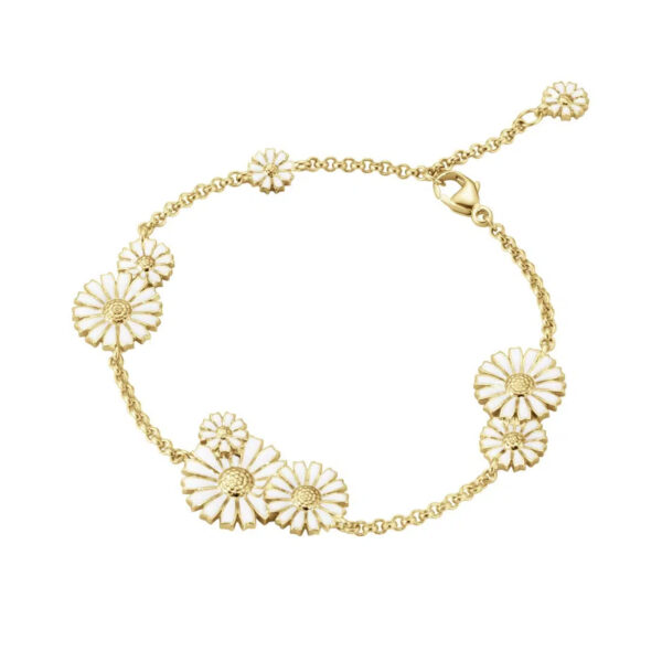 A gold-plated sterling silver multiple layered, white enamelled flower bracelet from Georg Jensen’s Daisy collection.
