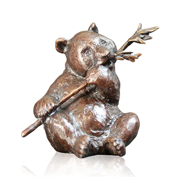 Made from solid foundry bronze, this piece depicts a hungry panda sitting eating bamboo.