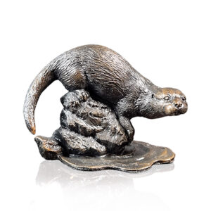 Made from solid foundry bronze, this piece depicts a small otter sitting quietly on a rock in a stream.
