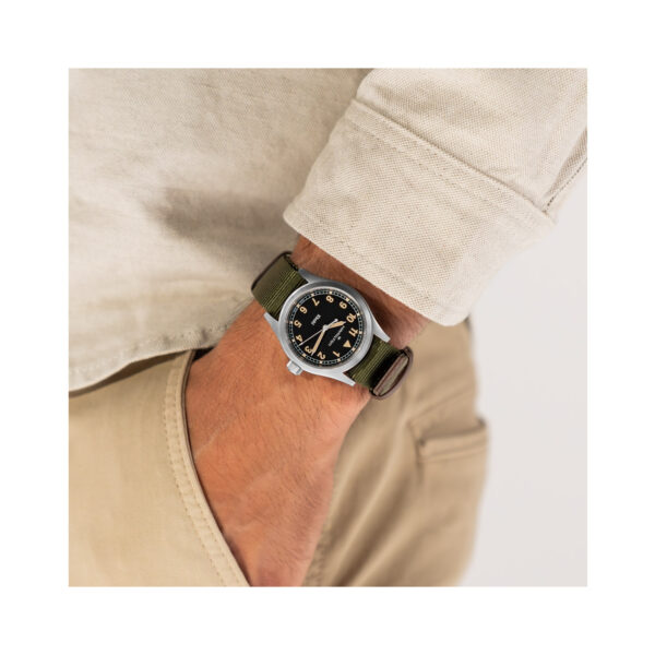 Hamilton, Khaki Field Black with a 38mm stainless steel case with a green NATO strap featuring a black dial with arabic numerals.