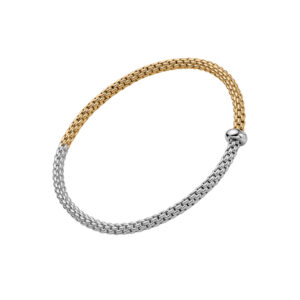 An 18ct white and yellow gold Flex'It bracelet with a single white gold diamond set rondel belonging to FOPE's Prima collection.