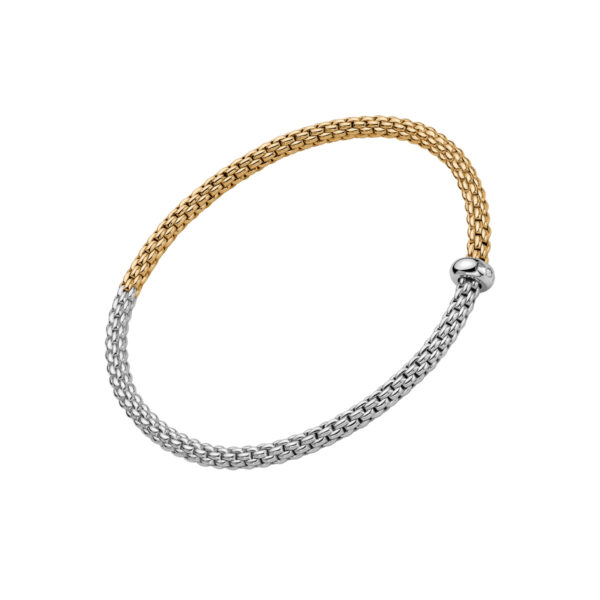 An 18ct white and yellow gold Flex'It bracelet with a single white gold diamond set rondel belonging to FOPE's Prima collection.