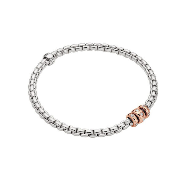 An 18ct white gold Flex'It bracelet with three 18ct rose gold diamond set rondels belonging to FOPE's EKA collection.