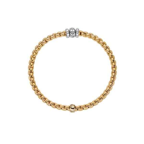 An 18ct yellow gold Flex'It bracelet with three 18ct white gold diamond set rondels belonging to FOPE's EKA collection.
