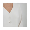 A sterling silver curved pendant and chain belonging to Georg Jensen's Mercy collection.