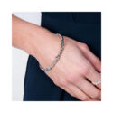 A sterling silver thin bangle from Lucy Quartermaine's Splash collection.