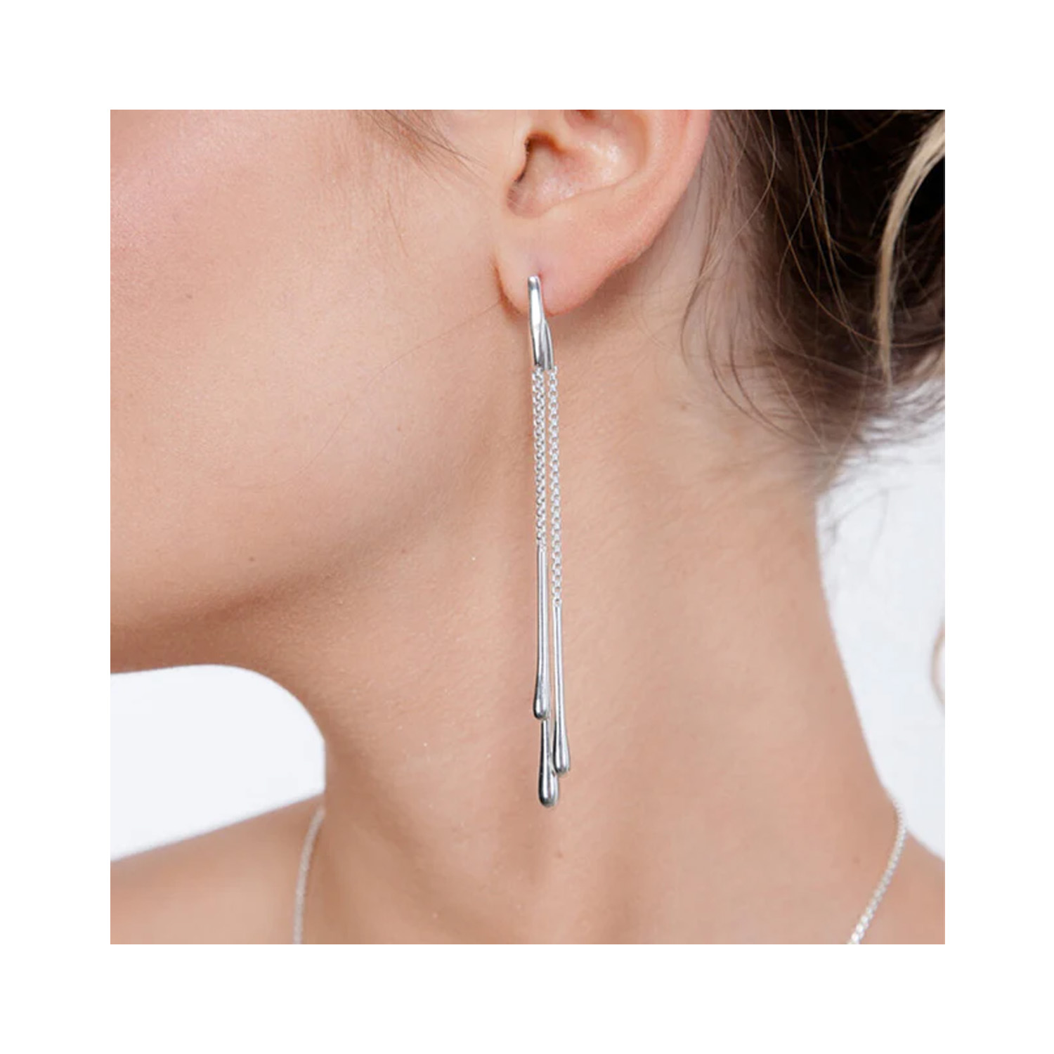 A pair of sterling silver multi drop earrings from Lucy Quartermaine's Drop collection, for pierced ears.