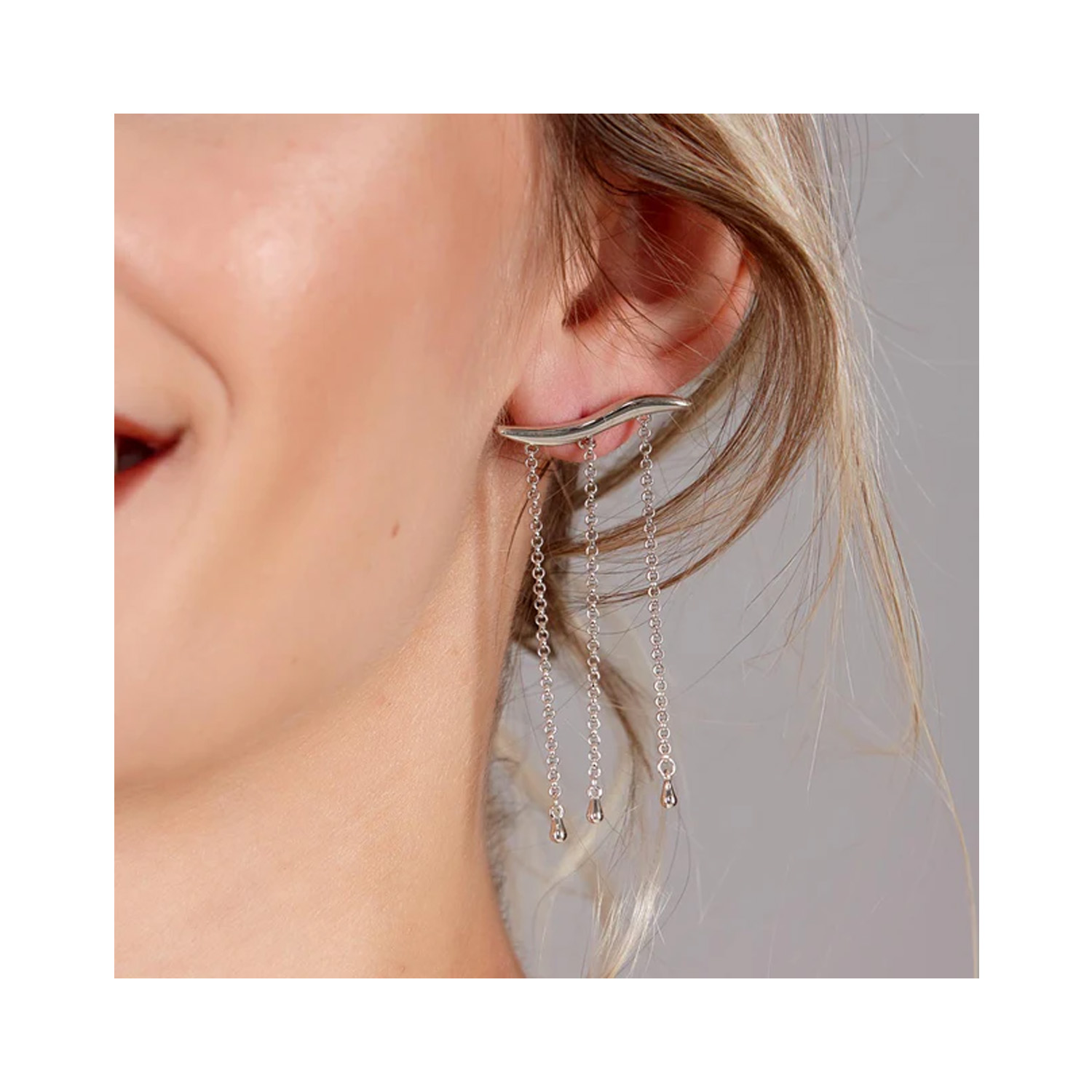 A pair of sterling silver waterfall stud earrings from Lucy Quartermaine's Waterfall collection, for pierced ears.