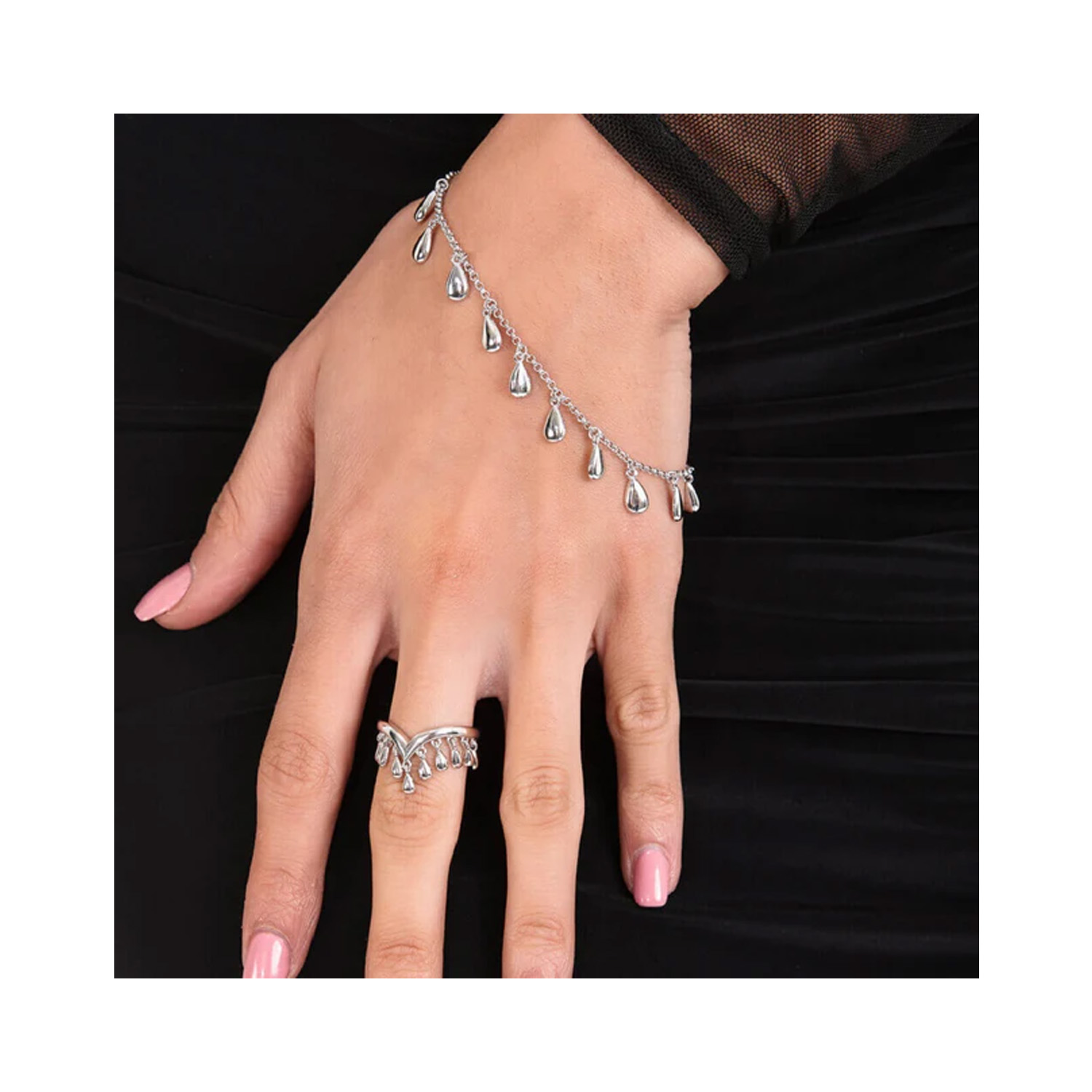 A sterling silver tear drop bracelet from Lucy Quartermaine's Drop collection.