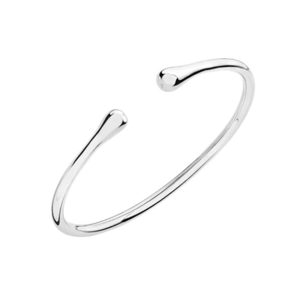 A sterling silver, polished bangle from Lucy Quartermaine's Drop collection.