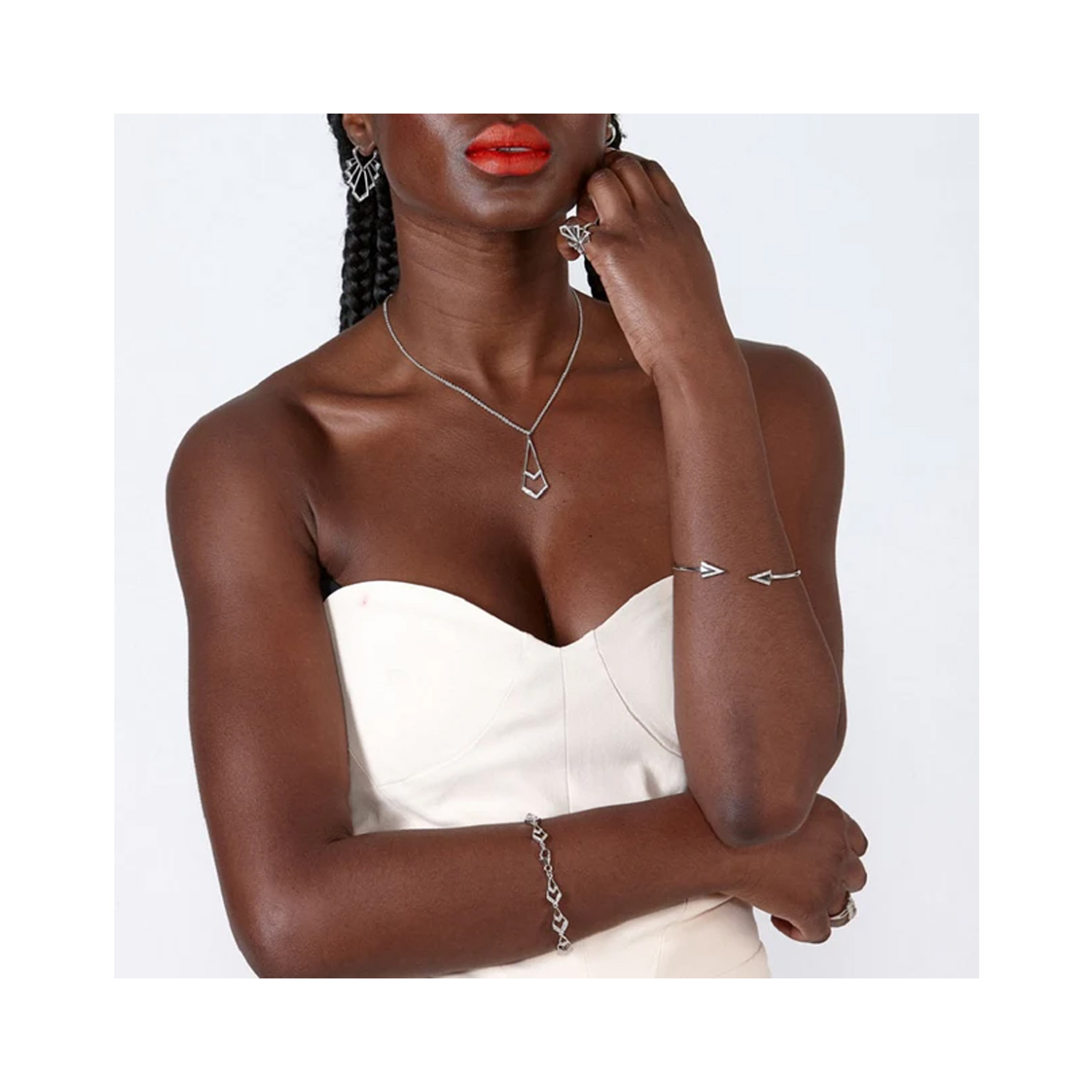 Lucy Quartermaine, Sterling Silver Art Deco Tie Pendant & Chain A sterling silver Art Deco style pendant set with white topaz gemstones on a chain from Lucy Quartermaine's Art Deco collection.