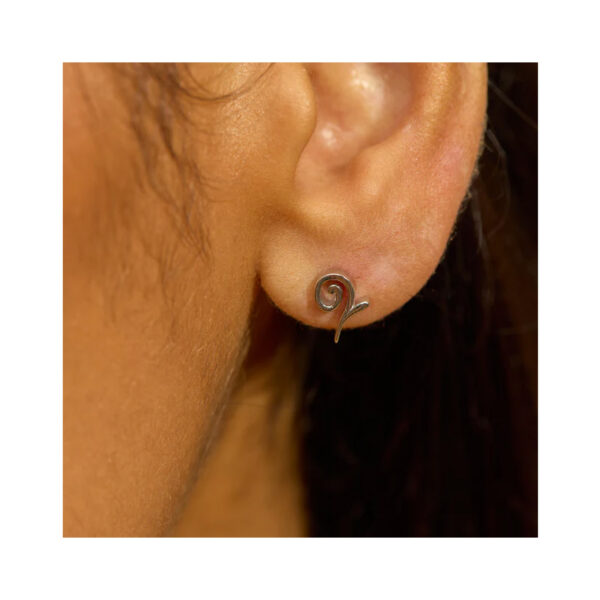 A pair of sterling silver 'Q' stud earrings from Lucy Quartermaine's Q collection, for pierced ears.