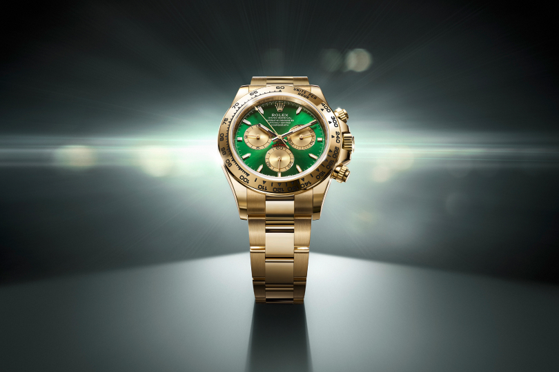 Rolex Cosmograph Daytona watch in gold and green