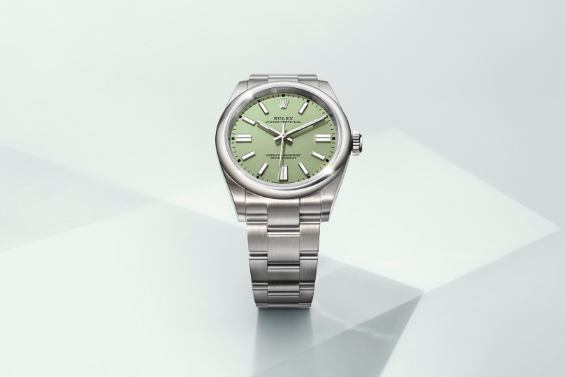 Rolex Oyster Perpetual watch with green dial