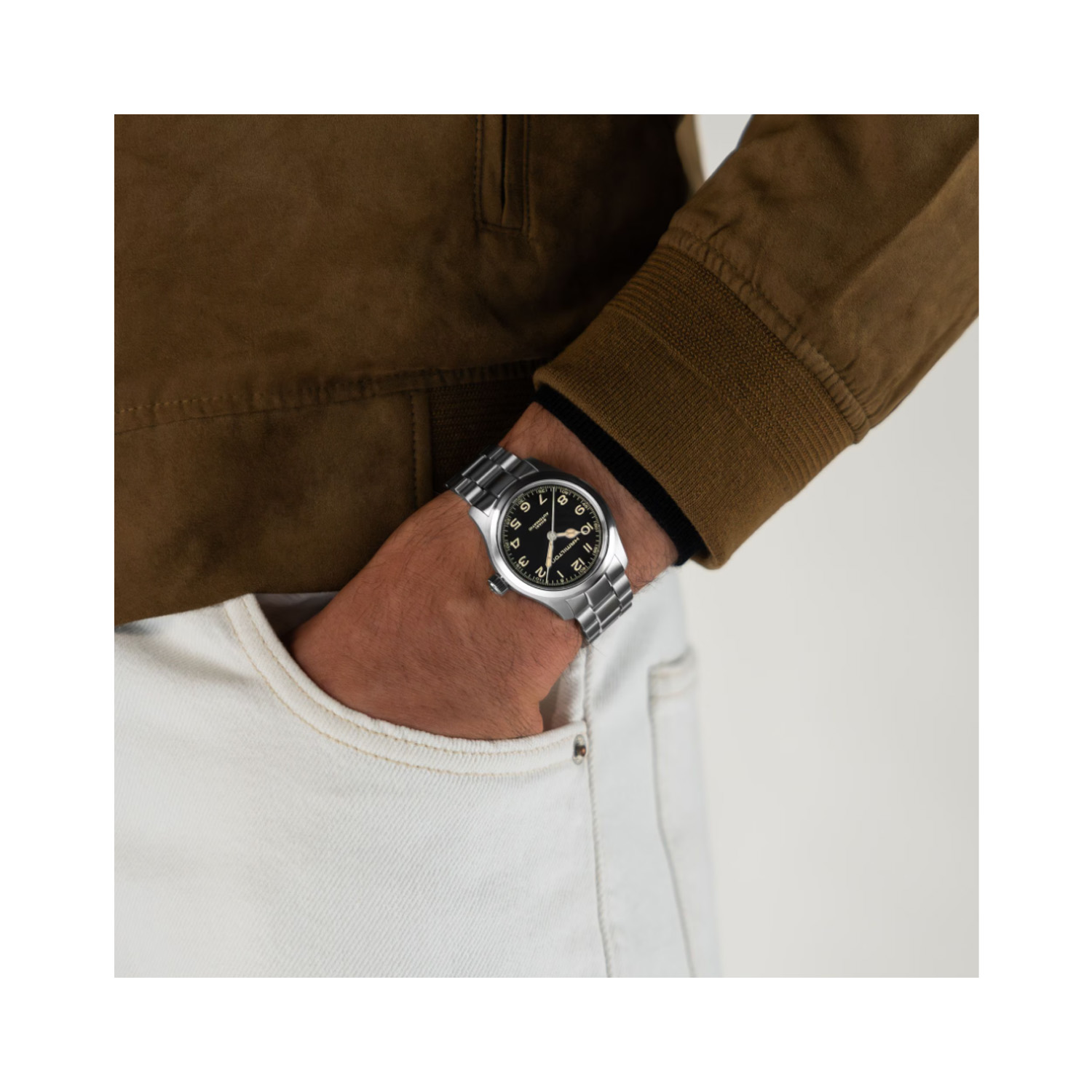 Hamilton, Khaki Field Murph with a 38mm stainless steel dial and bracelet strap featuring a black arabic numeral dial.