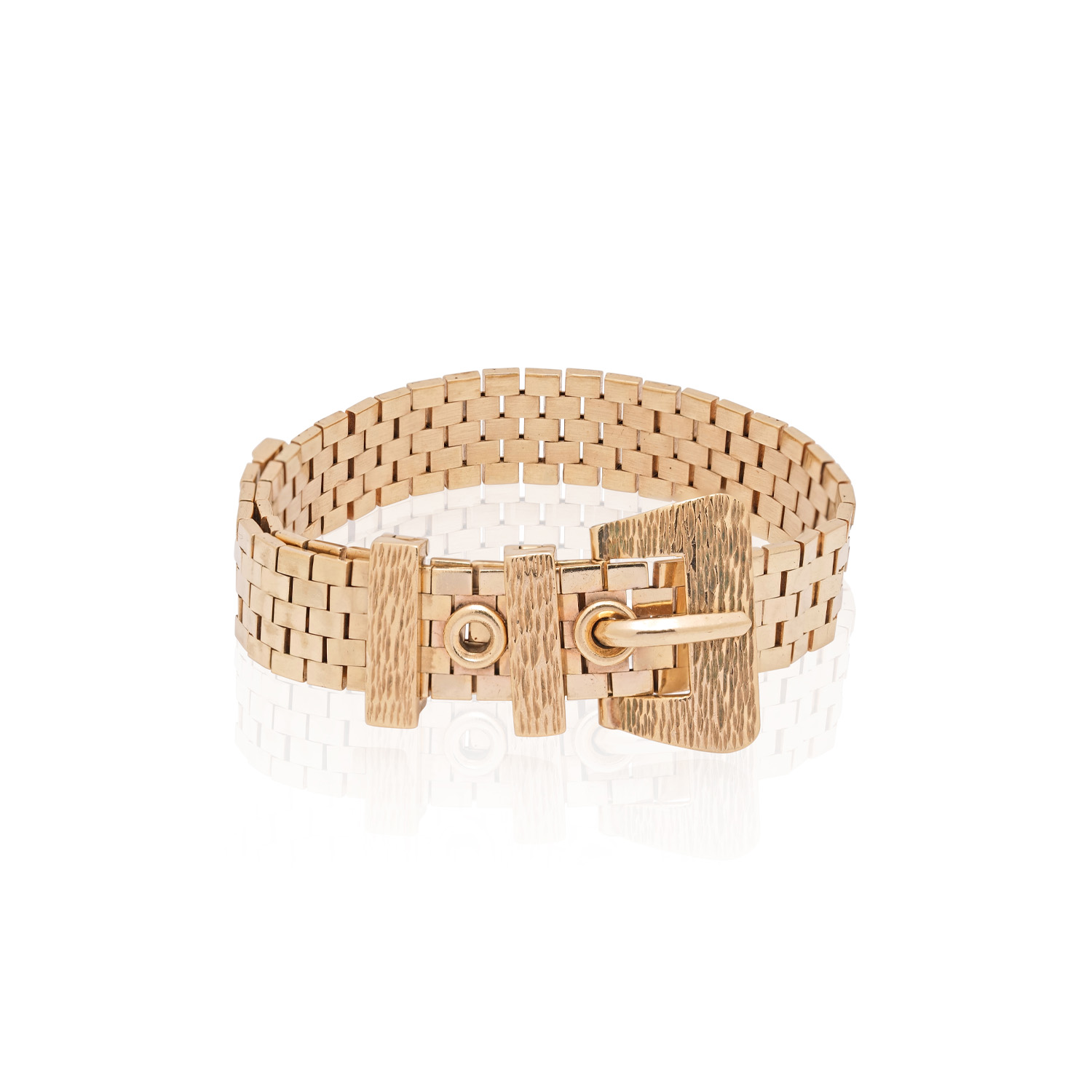 A 9ct yellow gold bracelet with a buckle style fastening. Hallmarked Birmingham 1977.