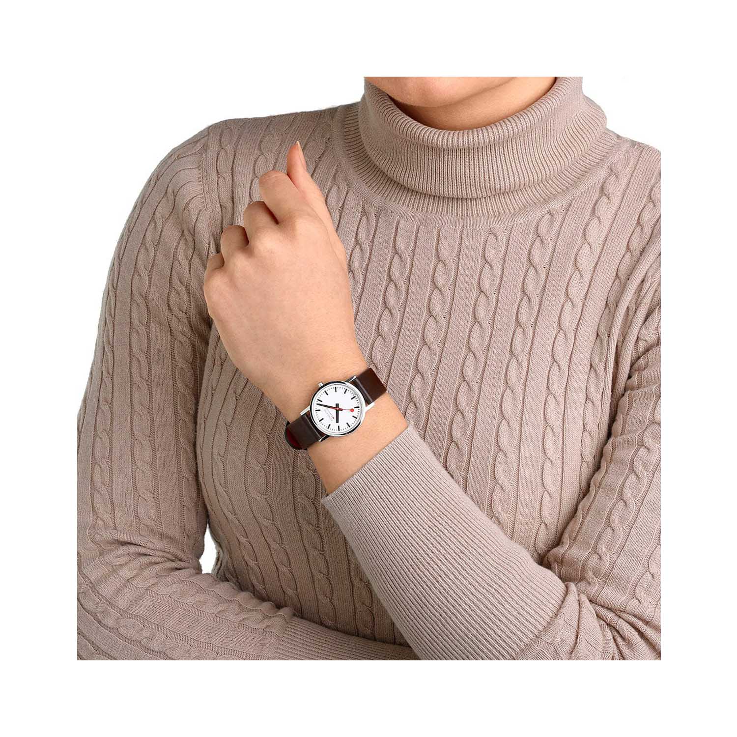 Mondaine, Classic Brown Strap, Quartz Unisex Watch Mondaine, Classic with a 30mm stainless steel case and a brown vegan grape leather strap featuring white dial.