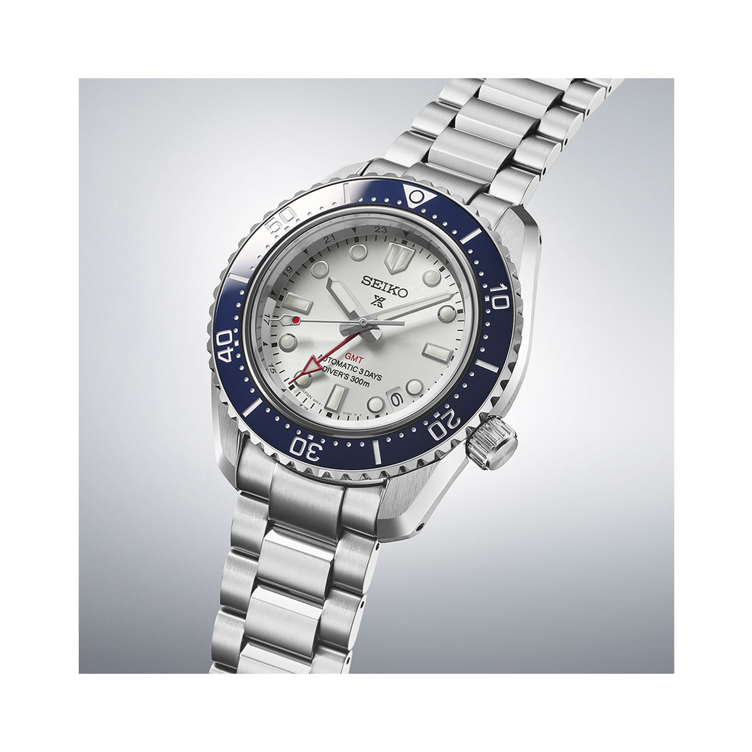 Seiko, Prospex 1968 Heritage Diver’s GMT 60th Anniversary, Automatic Men's Watch Seiko, Prospex 1968 Heritage Diver’s GMT 60th Anniversary with a 42mm stainless steel case and bracelet strap featuring a date and GMT function with a white dial and navy blue bezel.