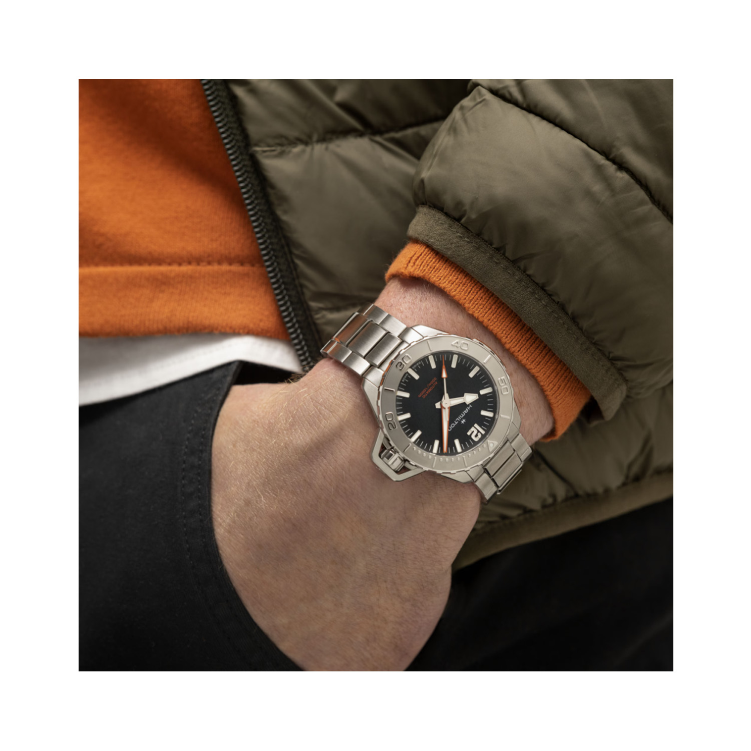 Hamilton, Khaki Navi Frogman with a 41mm stainless steel case and bracelet strap featuring a black dial with a grey bezel.