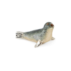 A sterling silver grey seal figurine from Saturno by Francis Howard.