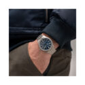 Hamilton, Khaki Field Titanium with a 42mm titanium case and bracelet strap featuring a blue dial.