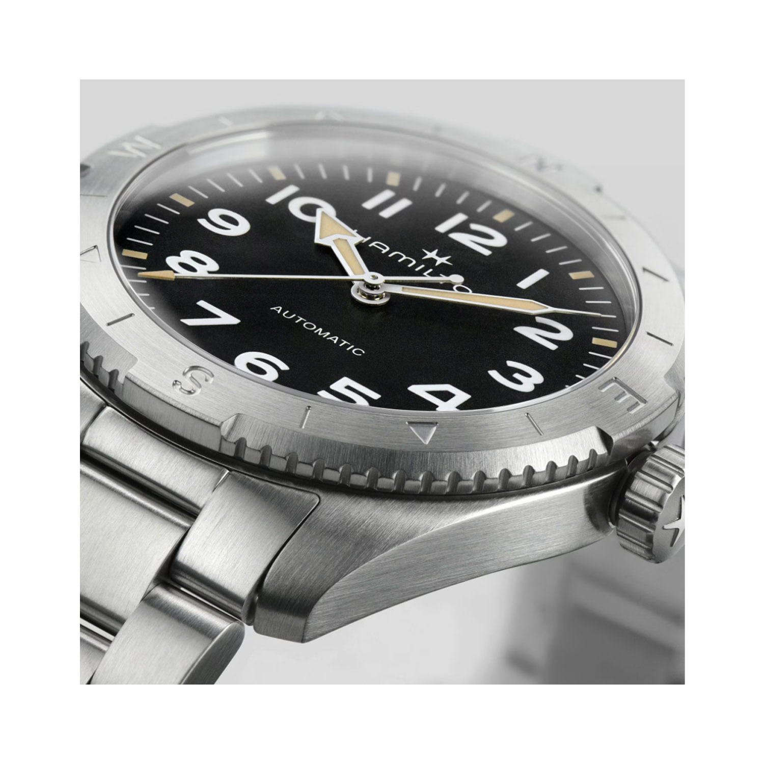 Hamilton, Khaki Field Expedition with a 37mm stainless steel case and bracelet strap featuring a black dial with a silver compass bezel.