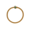 An 18ct yellow gold Flex'It bracelet with an emerald and diamond rondel and a polished diamond set rondel, belonging to FOPE's Solo collection.
