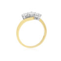 An 18ct yellow and white gold round brilliant cut diamond three stone ring. Hallmarked Birmingham 2011.