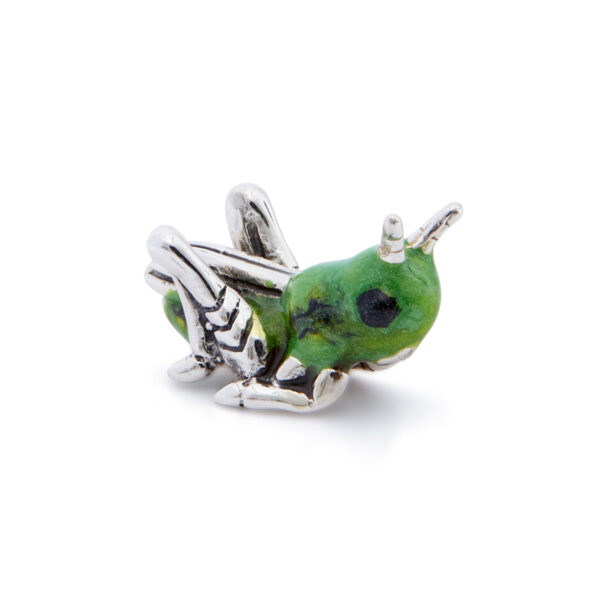 A sterling silver very small grasshopper figurine from Saturno by Francis Howard.