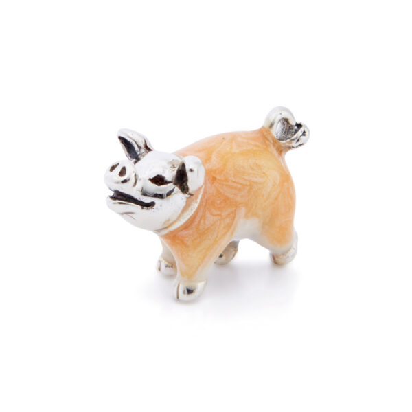 A sterling silver very small pig figurine from Saturno by Francis Howard.