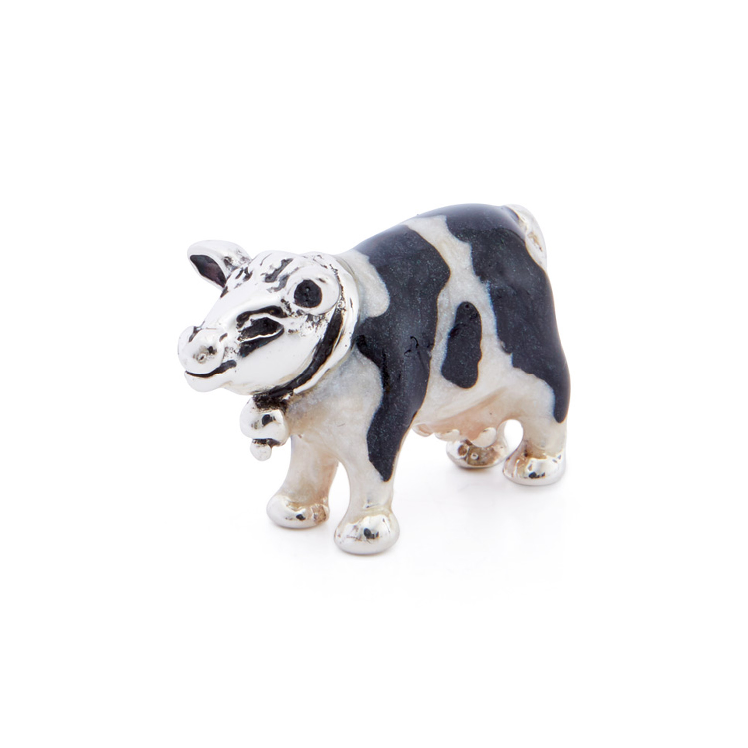 A sterling silver very small cow figurine from Saturno by Francis Howard.