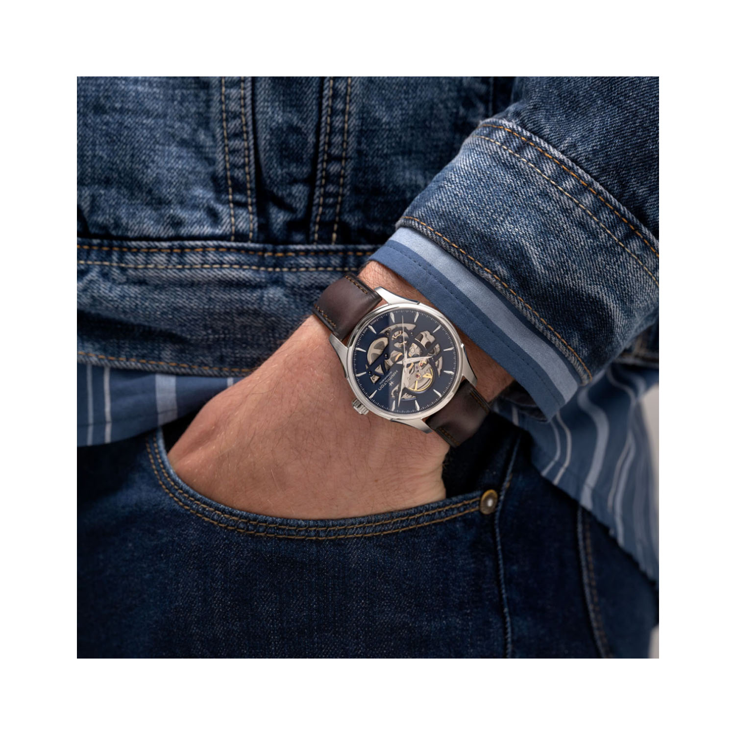 Hamilton, Jazzmaster Skeleton with a 40mm stainless steel case and a brown leather strap featuring a blue cut-out skeleton dial.