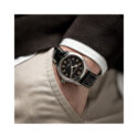Hamilton, Khaki Field Murph with a 38mm stainless steel case and a black leather strap featuring a black dial.