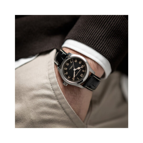 Hamilton, Khaki Field Murph with a 38mm stainless steel case and a black leather strap featuring a black dial.
