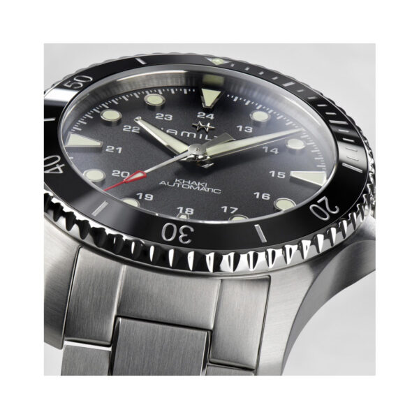 Hamilton, Khaki Navy Scuba with a 43mm stainless steel case and bracelet strap featuring a black dial and bezel.