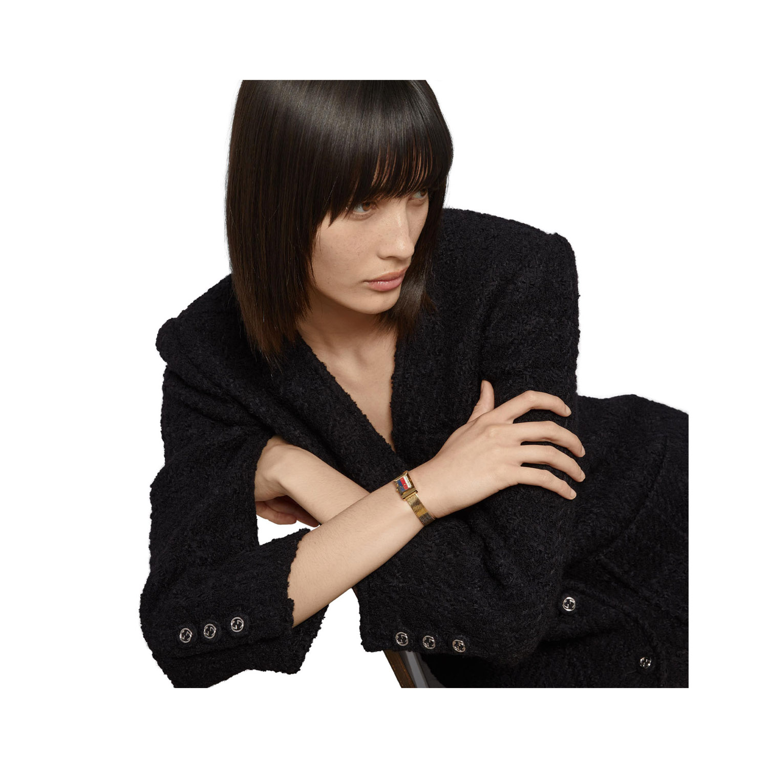 Gucci G-Frame White, Red & Blue, Quartz Women's Watch Gucci G-Frame with a 25 x 14mm stainless steel gold PVD plated case and bracelet strap with a white, red and blue coloured brass dial.