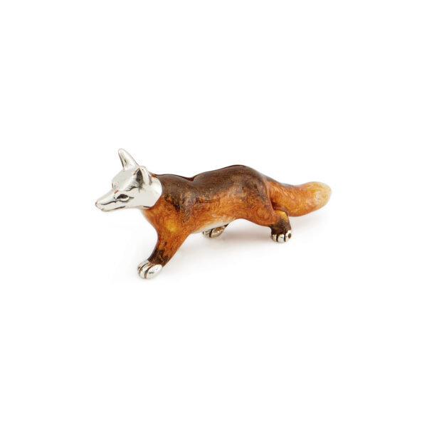 A sterling silver walking fox figurine from Saturno by Francis Howard.