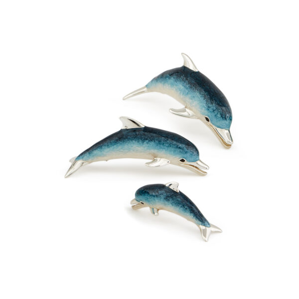 A sterling silver dolphin figurine from Saturno by Francis Howard.