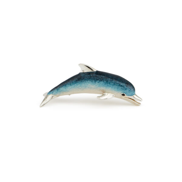 A sterling silver dolphin figurine from Saturno by Francis Howard.