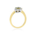 A 14ct yellow and white gold emerald and round brilliant cut diamond flower style double cluster ring.